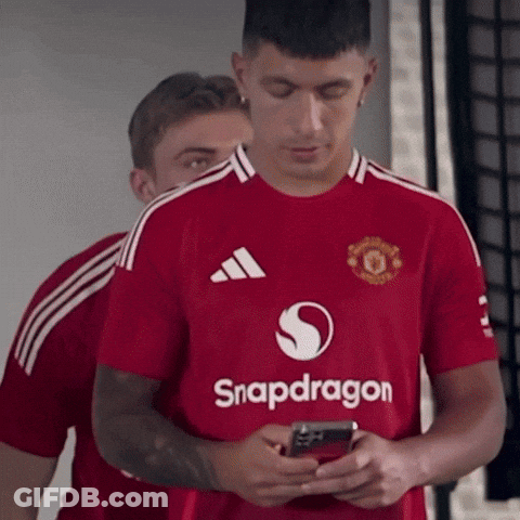 A Man Wearing A Red Shirt That Says Snapdragon On It GIF
