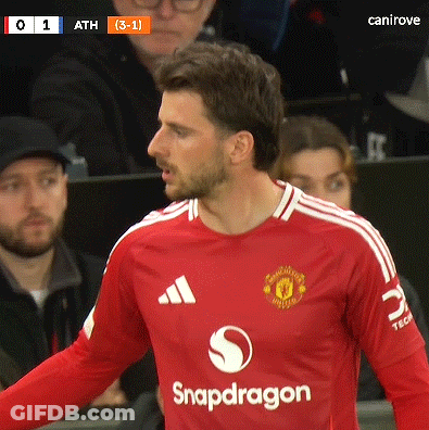A Man Wearing A Red Shirt That Says Snapdragon On The Front GIF