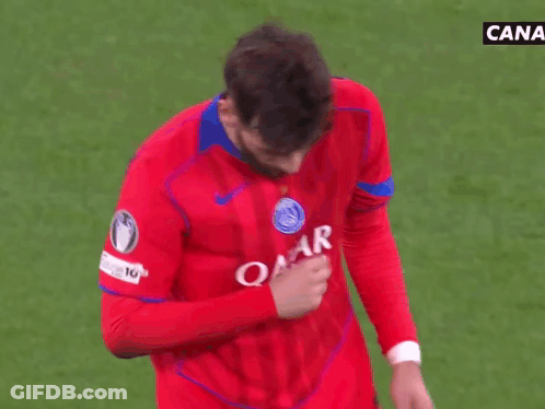 A Man Wearing A Red Shirt That Says Star Airways Holds His Hand To His Chest GIF