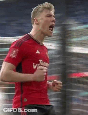 A Man Wearing A Red Shirt That Says Team Vi GIF