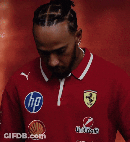 A Man Wearing A Red Shirt With An Hp Logo On The Front GIF