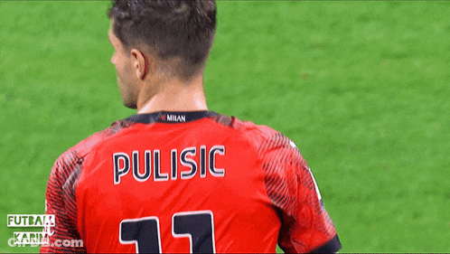 A Man Wearing A Red Shirt With The Name Pulisic On It GIF
