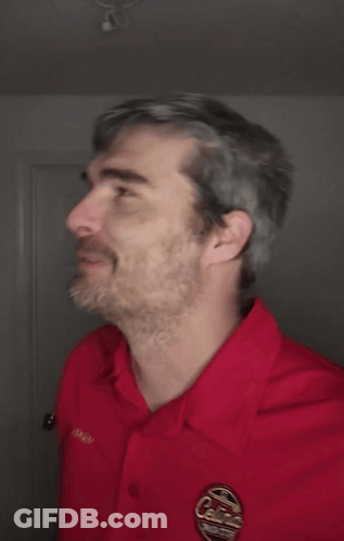 A Man Wearing A Red Shirt With The Word Dammit On The Bottom GIF