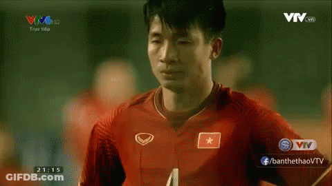 A Man Wearing A Red Soccer Jersey With A Star On The Front GIF