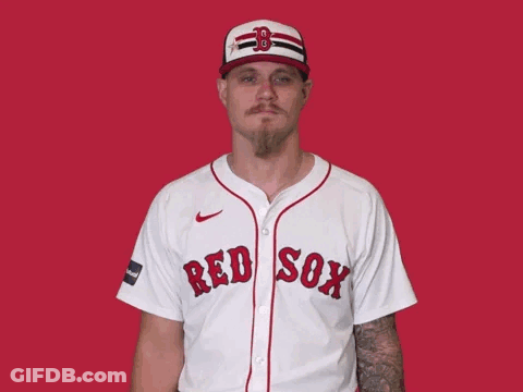 A Man Wearing A Red Sox Jersey And Hat GIF