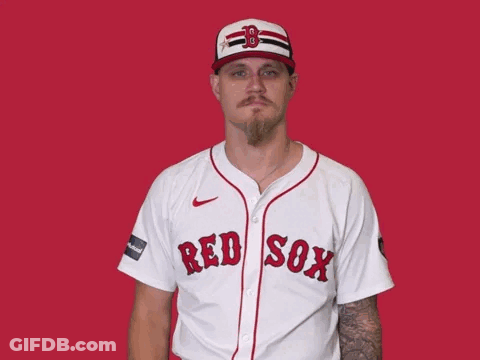 A Man Wearing A Red Sox Jersey And Hat GIF