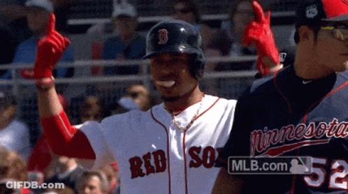 A Man Wearing A Red Sox Jersey Is Giving A Thumbs Up Sign GIF