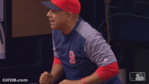 A Man Wearing A Red Sox Shirt And Hat GIF