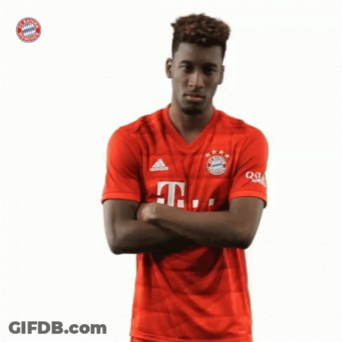 A Man Wearing A Red T-Mobile Jersey With His Hands On His Hips GIF