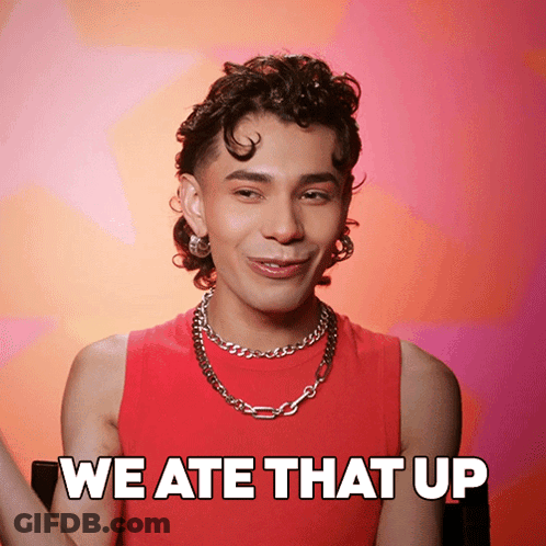 A Man Wearing A Red Tank Top And A Chain Around His Neck Says We Ate That Up GIF