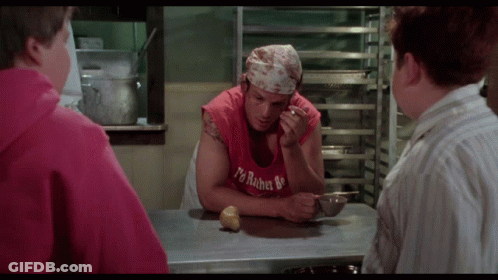 A Man Wearing A Red Tank Top That Says ' I 'M Robert ' On It GIF