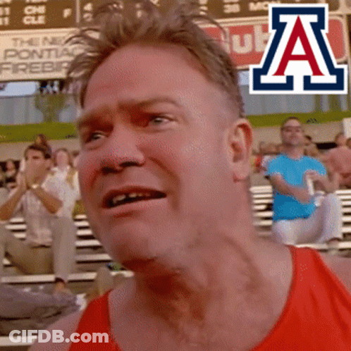 A Man Wearing A Red Tank Top With An A Logo On It GIF