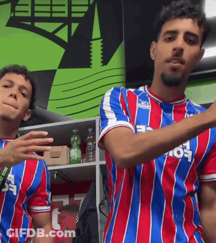 A Man Wearing A Red White And Blue Striped Shirt With The Letter F On It GIF