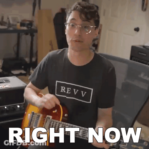 Man In Revv Shirt Playing Guitar GIF