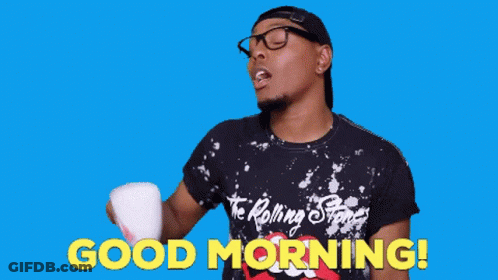 A Man Wearing A Rolling Stones Shirt Is Holding A Cup In His Hand And Says Good Morning GIF