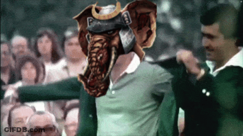 A Man Wearing A Samurai Helmet With The Letter P On It GIF