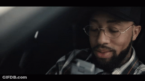 A Man Wearing A San Francisco Hat And Glasses GIF