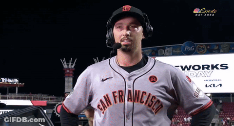 A Man Wearing A San Francisco Jersey With A Microphone GIF