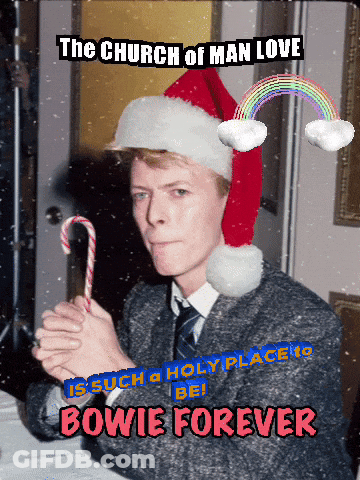 A Man Wearing A Santa Hat Is Holding A Candy Cane With The Words " The Church Of Man Love " Above Him GIF