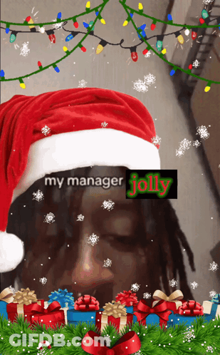 A Man Wearing A Santa Hat With The Words " My Manager Jolly " GIF
