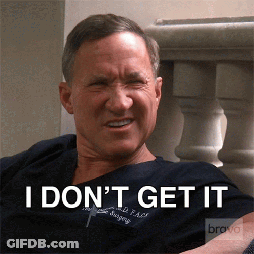 A Man Wearing A Scrub Top That Says I Don 'T Get It On It GIF