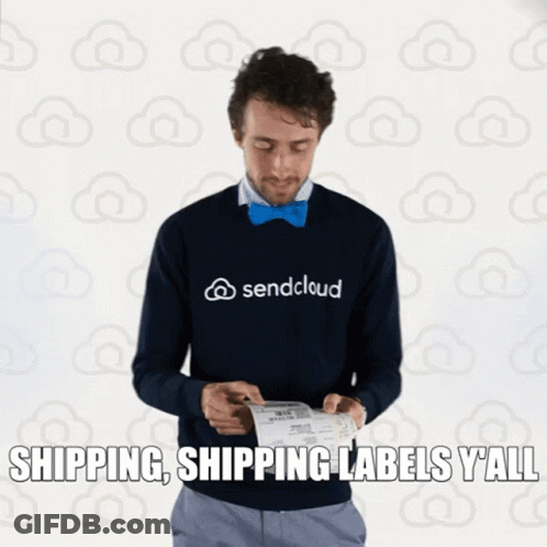 A Man Wearing A Sendcloud Sweater Looks At A Shipping Label GIF