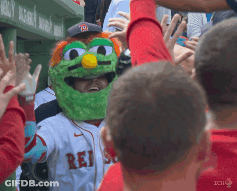 A Man Wearing A Sesame Street Mask With The Word Rei On His Jersey GIF