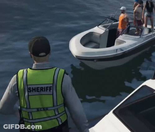 A Man Wearing A Sheriff Vest Is Standing Next To A Boat GIF