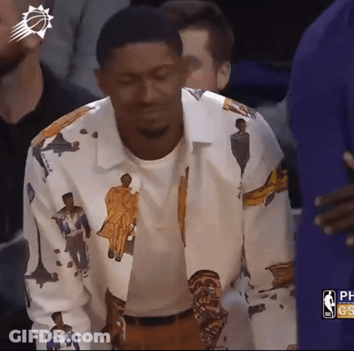 A Man Wearing A Shirt That Has A Picture Of A Man On It GIF