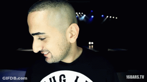 A Man Wearing A Shirt That Says 16 Bars GIF