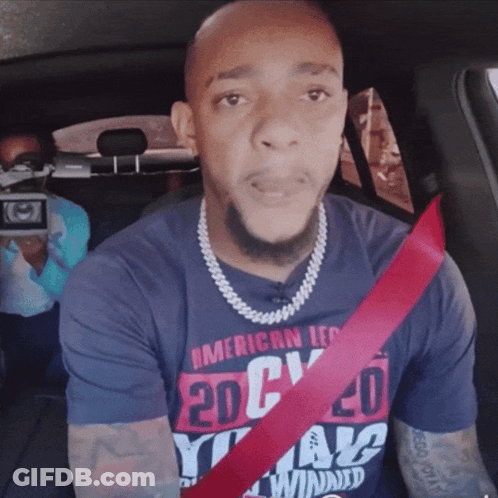 A Man Wearing A Shirt That Says American Legion GIF