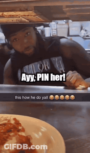 A Man Wearing A Shirt That Says Ayy Pin Her Is Looking At A Plate Of Food GIF