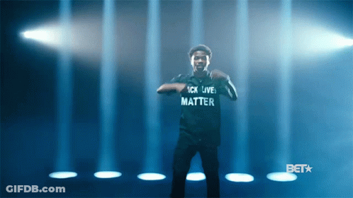 A Man Wearing A Shirt That Says " Black Lives Matter " GIF