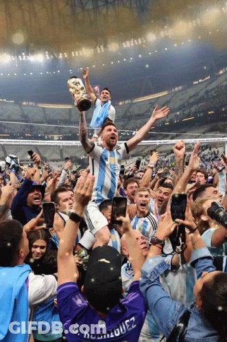 A Man Wearing A Shirt That Says D. Rodriguez Holds A Trophy GIF