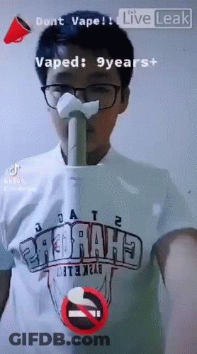 A Man Wearing A Shirt That Says " Dont Vape " GIF