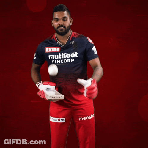 A Man Wearing A Shirt That Says Exide Multhoot Fincorp On It GIF