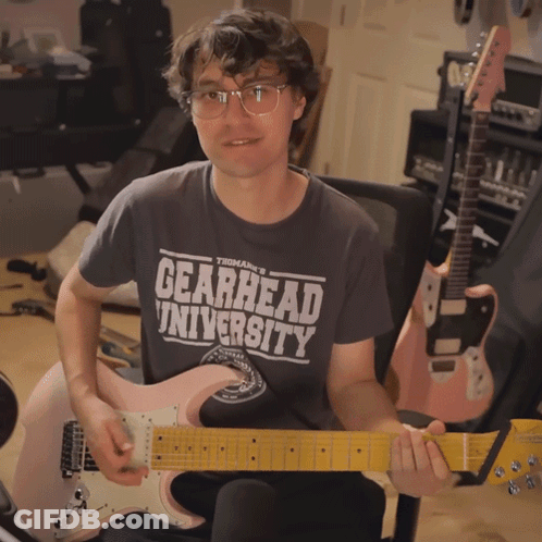 Man Wearing Gearhead University Shirt GIF