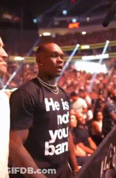 A Man Wearing A Shirt That Says He Is Not Your Ban GIF