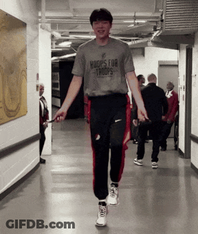 A Man Wearing A Shirt That Says Hoops For Troops Jumps A Jump Rope GIF