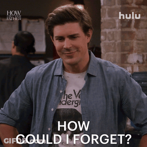 A Man Wearing A Shirt That Says How Could I Forget On It GIF