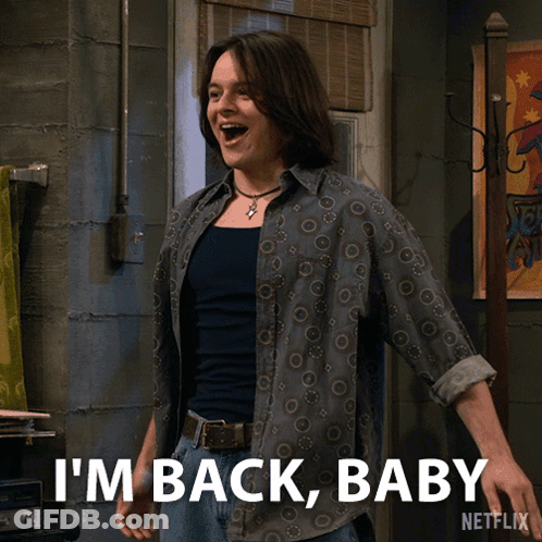 A Man Wearing A Shirt That Says I 'M Back Baby On It GIF