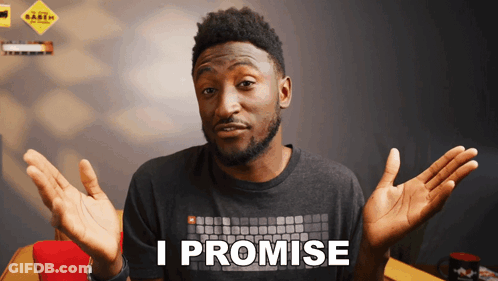 A Man Wearing A Shirt That Says " I Promise " GIF