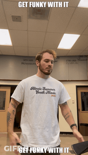 A Man Wearing A Shirt That Says Illinois Summer Youth Ministries GIF