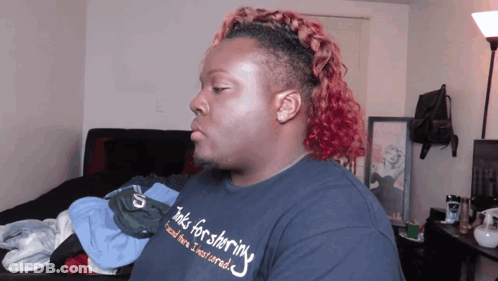 A Man Wearing A Shirt That Says " Inks For Sharing " GIF