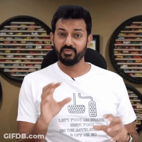A Man Wearing A Shirt That Says Left Foot On Brake Right Foot On The Accelerator GIF