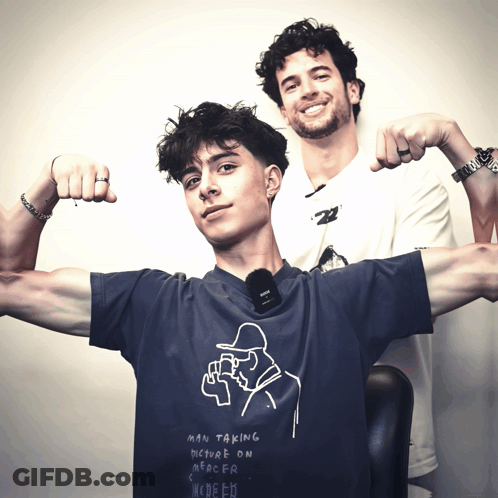 A Man Wearing A Shirt That Says Man Taking Picture On Nerdfr GIF