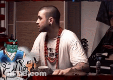A Man Wearing A Shirt That Says ' Nc Hip Hop ' On It GIF