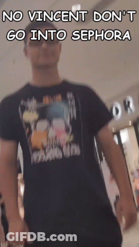 A Man Wearing A Shirt That Says ' No Vincent Do N't Go Into Sephora ' On It GIF