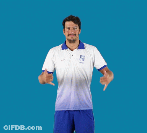A Man Wearing A Shirt That Says ' Noticias ' On It Giving A Thumbs Up GIF