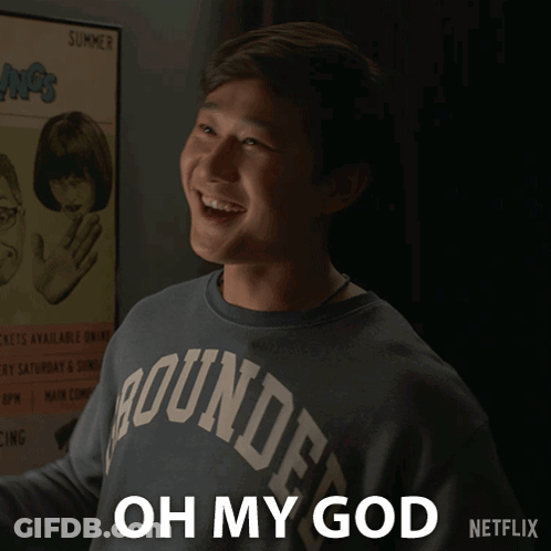 A Man Wearing A Shirt That Says Oh My God GIF